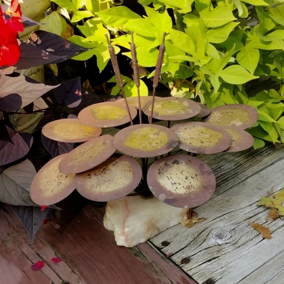 Vintage patina metal cattails and lily pads